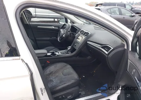 2014 Ford Fusion Hybrid Titanium z USA, uszkodzony, nr VIN 3FA6P0RU6ER299616